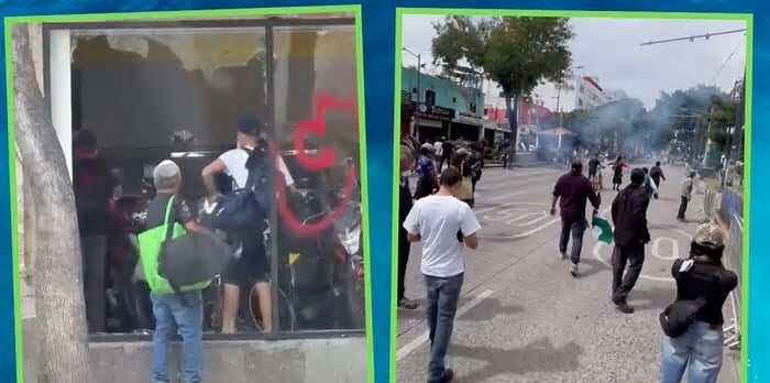 Manifestantes expulsan a encapuchados en marcha de Guadalajara